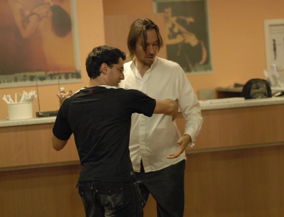 In 2007, Shawn closely observes one dancer’s movement during a class