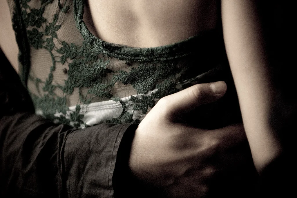 Detail of touch in an Argentine tango embrace, photographed by Shawn